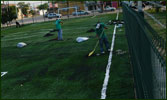 Instalación de pasto sintético en campo de futbol 7