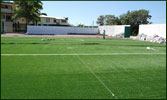 Instalación de pasto sintético en campo de futbol 7