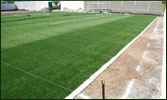 Instalación de pasto sintético en campo de futbol 7